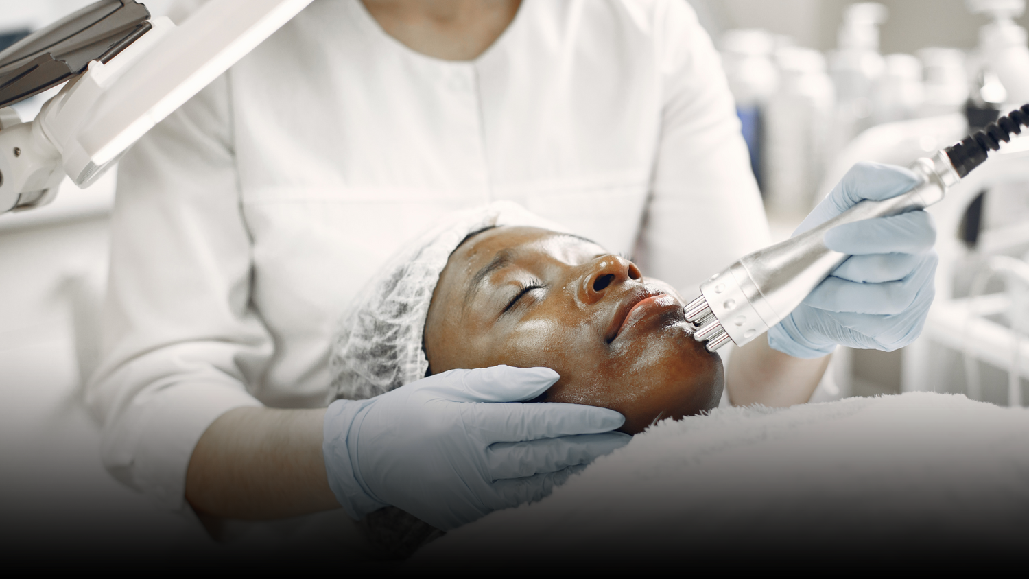 Skincare treatment session in a clinic setting.