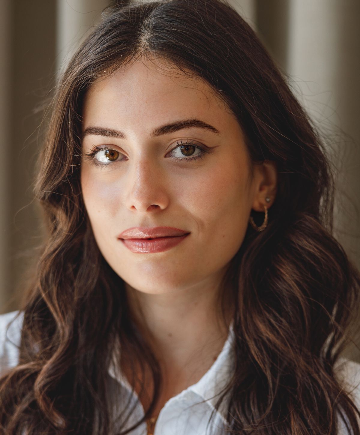 Close-up of a woman with radiant skin.