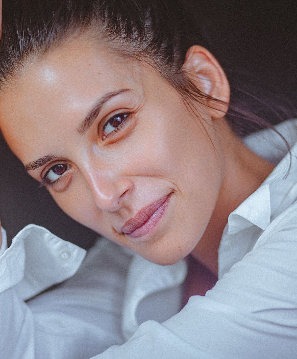 Close-up of a woman with radiant skin.